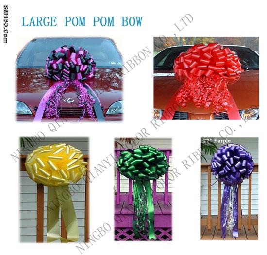 a large pom pom bow