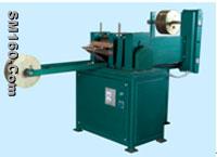 cutting machine for metallic strip