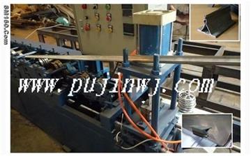 Ceiling production line for spring tee machine