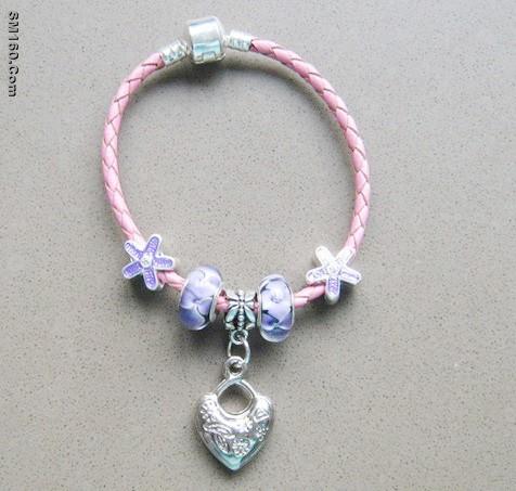 Leather cord bracelet with charms